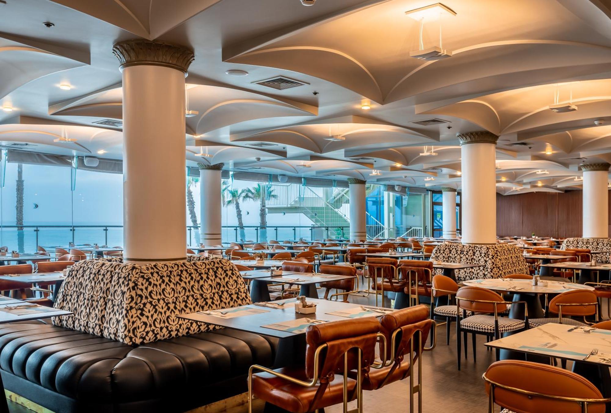 Daniel Herzliya Hotel Esterno foto The interior of the restaurant