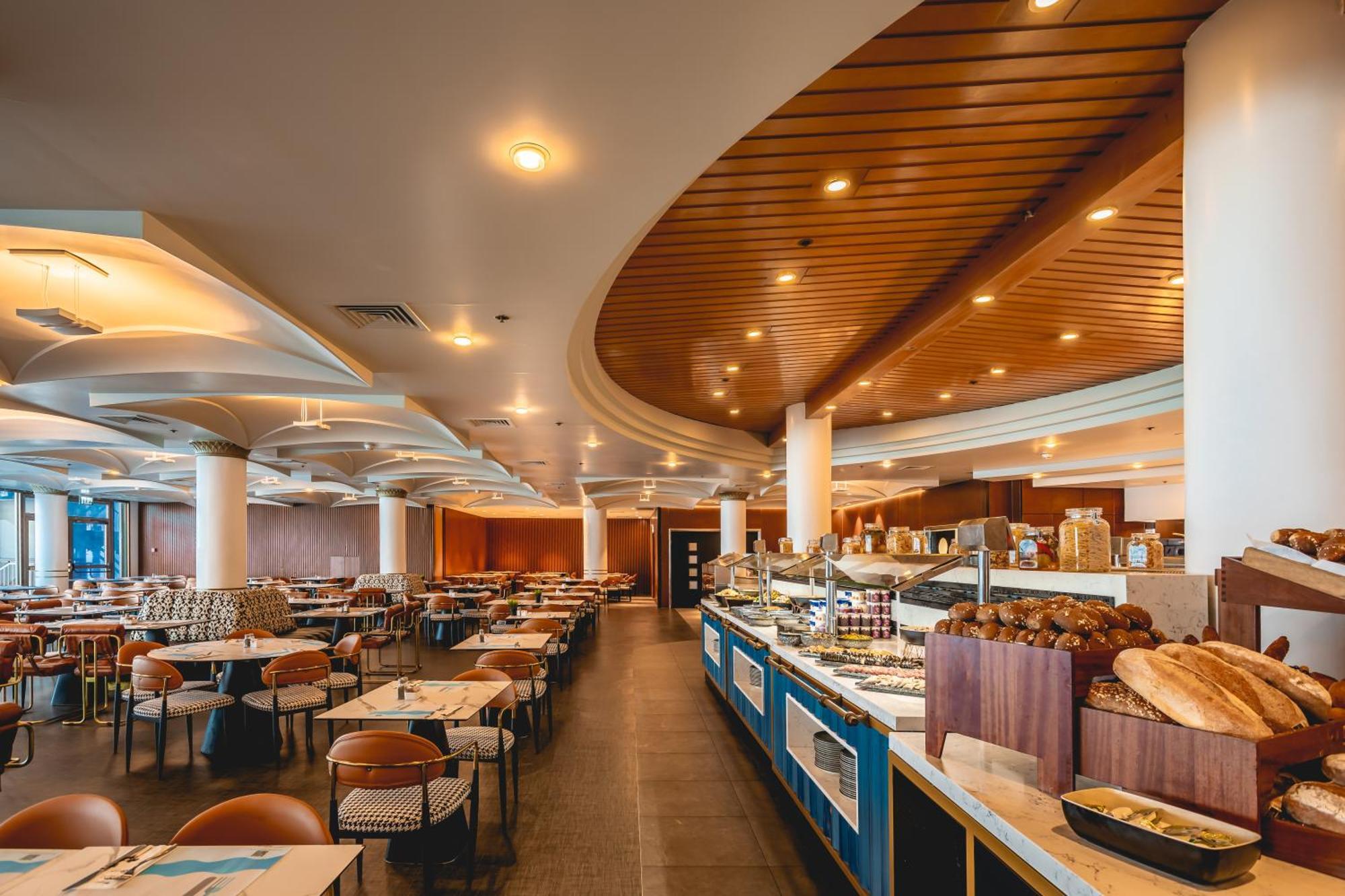 Daniel Herzliya Hotel Esterno foto The restaurant at the hotel